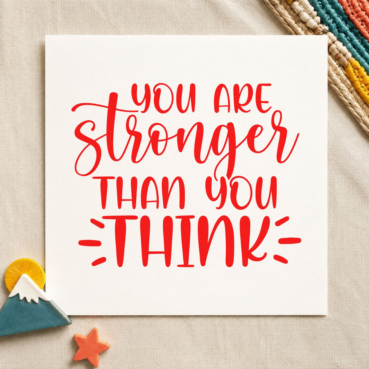 You Are Stronger Than Think rubber stamp shown in red ink, stamped for projects such as bin grip labels.