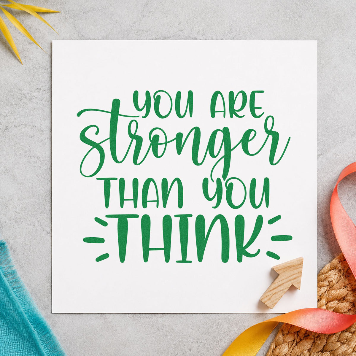 You Are Stronger Than Think craft stamp imprint in green ink on a handmade project, one idea being wave plan cards.