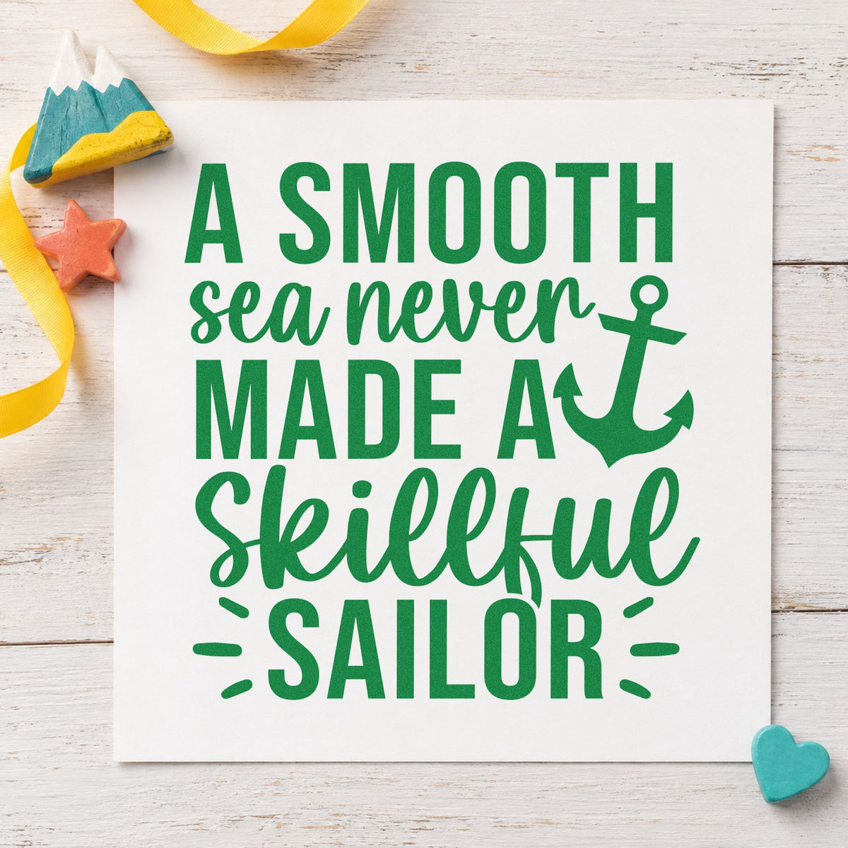 Smooth Sea Skillful Sailor craft stamp imprint in green ink on a handmade project, one idea being crew brief cards.