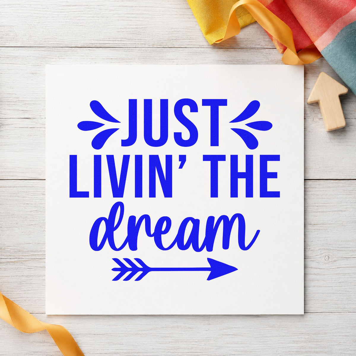 Just Livin The Dream craft stamp in blue ink on cardstock, an easy option for curtain panel printing.