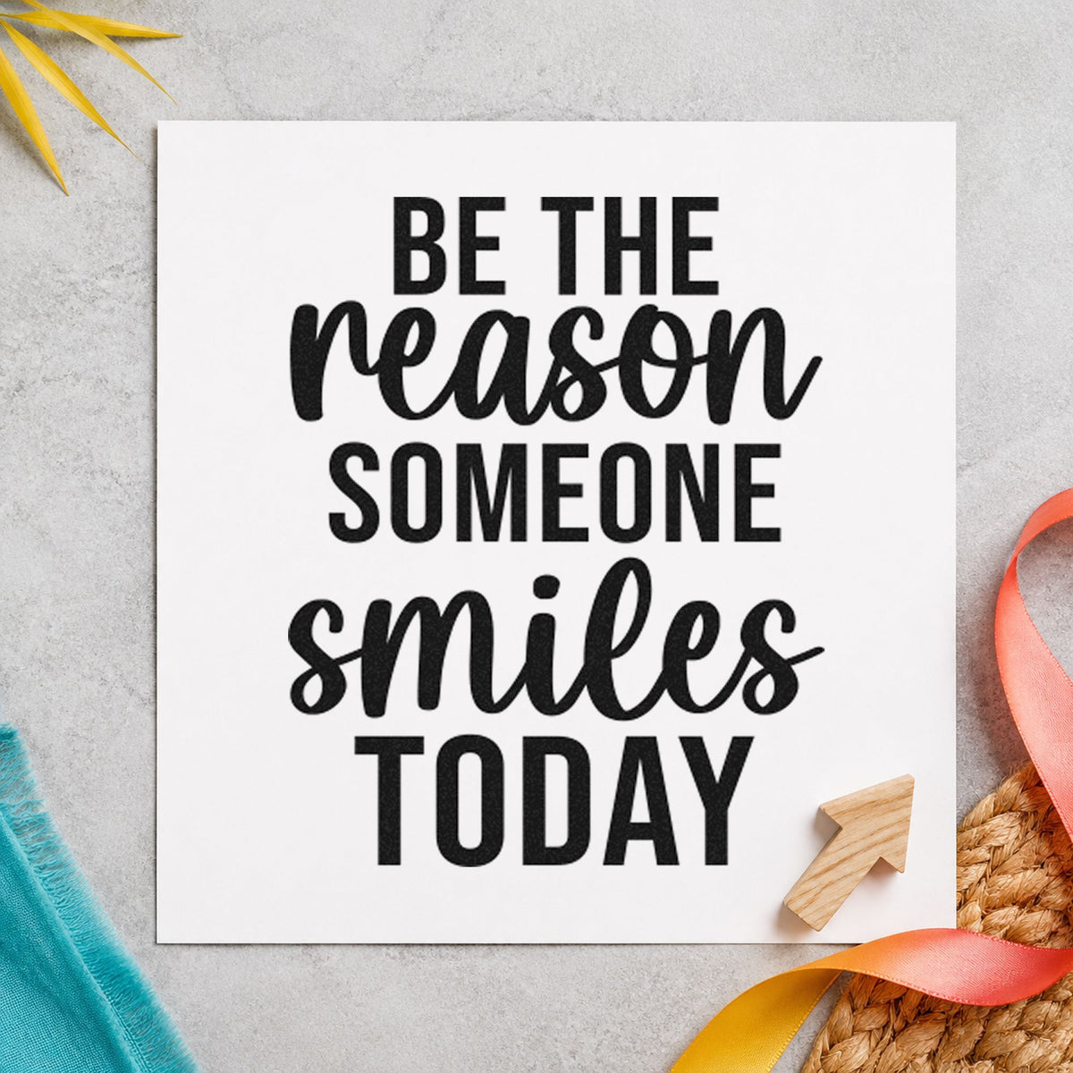 Reason Someone Smiles Today craft stamp imprint in black ink on a handmade project, one idea being holiday gift tags.