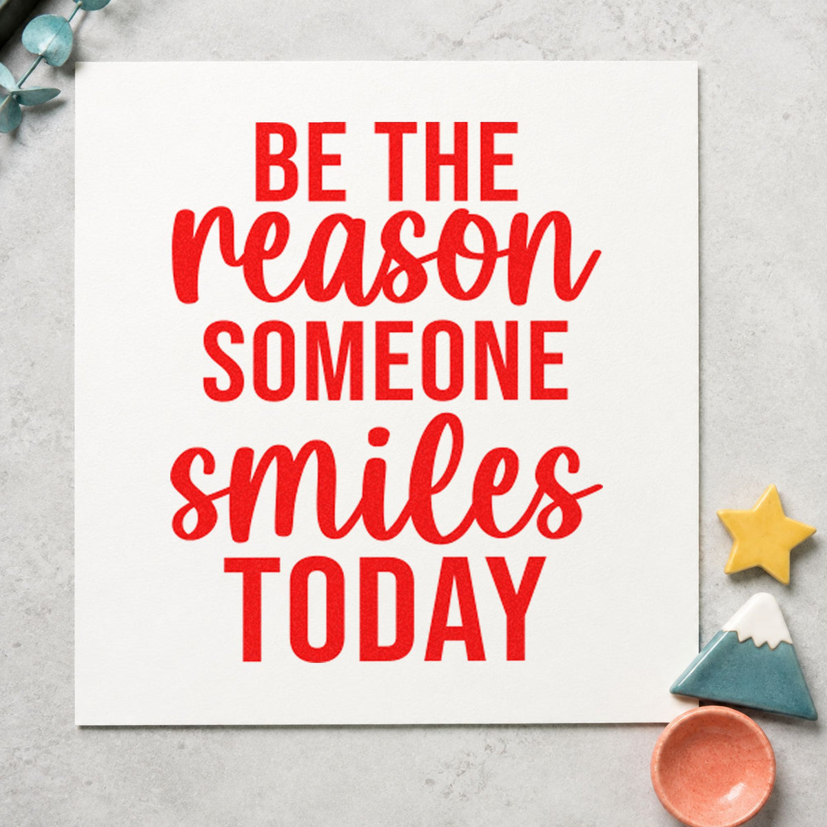Reason Someone Smiles Today craft stamp imprint in red ink on a handmade project, one idea being neighbor note cards.
