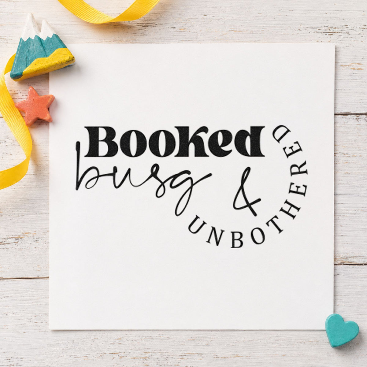 Booked Busy And Unbothered rubber stamp printed in black ink, ready for booking week sheet and similar paper crafts.