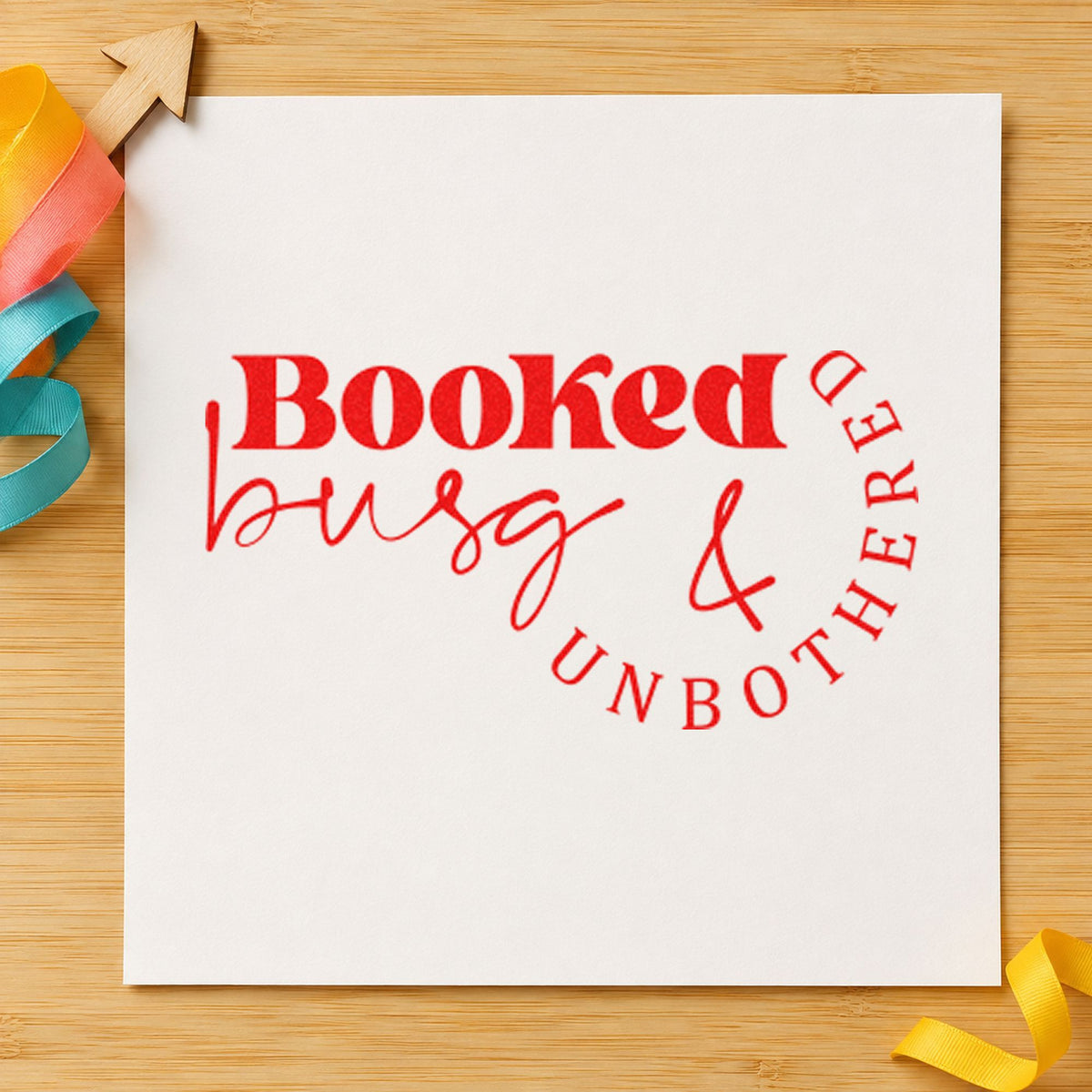 Booked Busy And Unbothered rubber stamp shown in red ink, stamped for projects such as drawer tray labels.