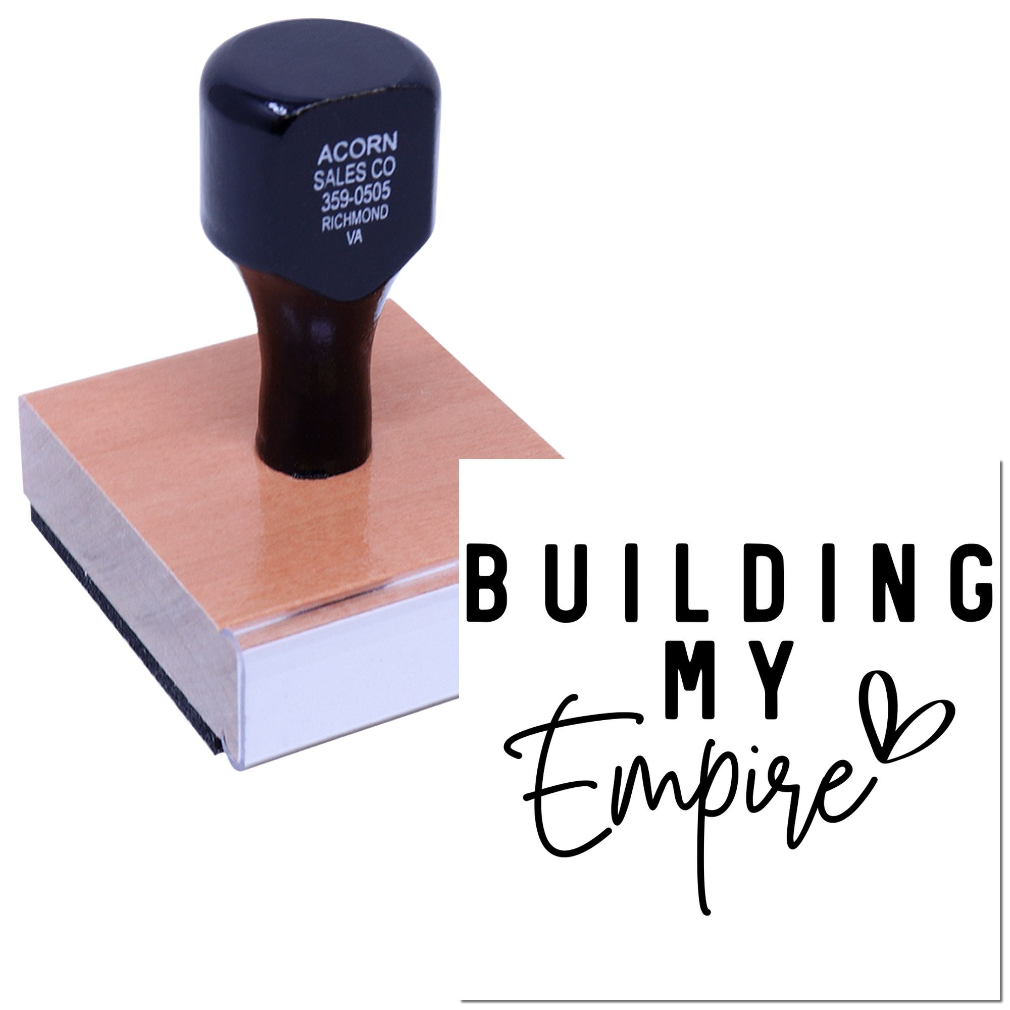 Custom rubber stamp on wooden block with Building My Empire design for branding and packaging.