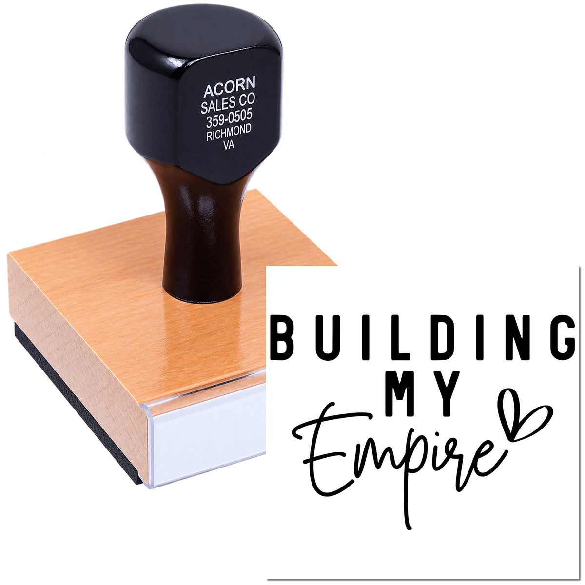 Custom rubber stamp on wooden block with Building My Empire design for branding and packaging.
