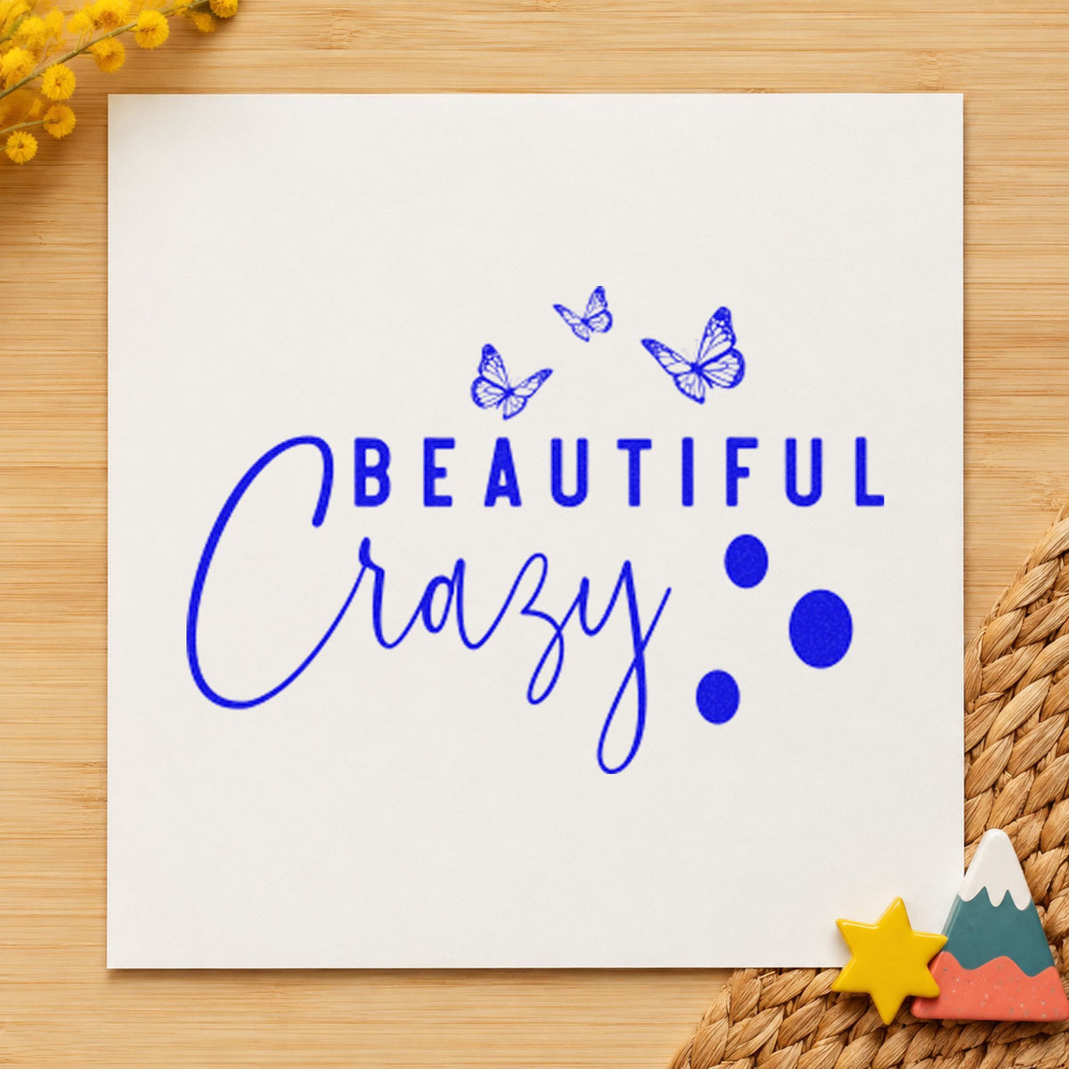 Beautiful Crazy Butterflies craft stamp imprinted in blue ink on paper, a design suited to framed rental hall.