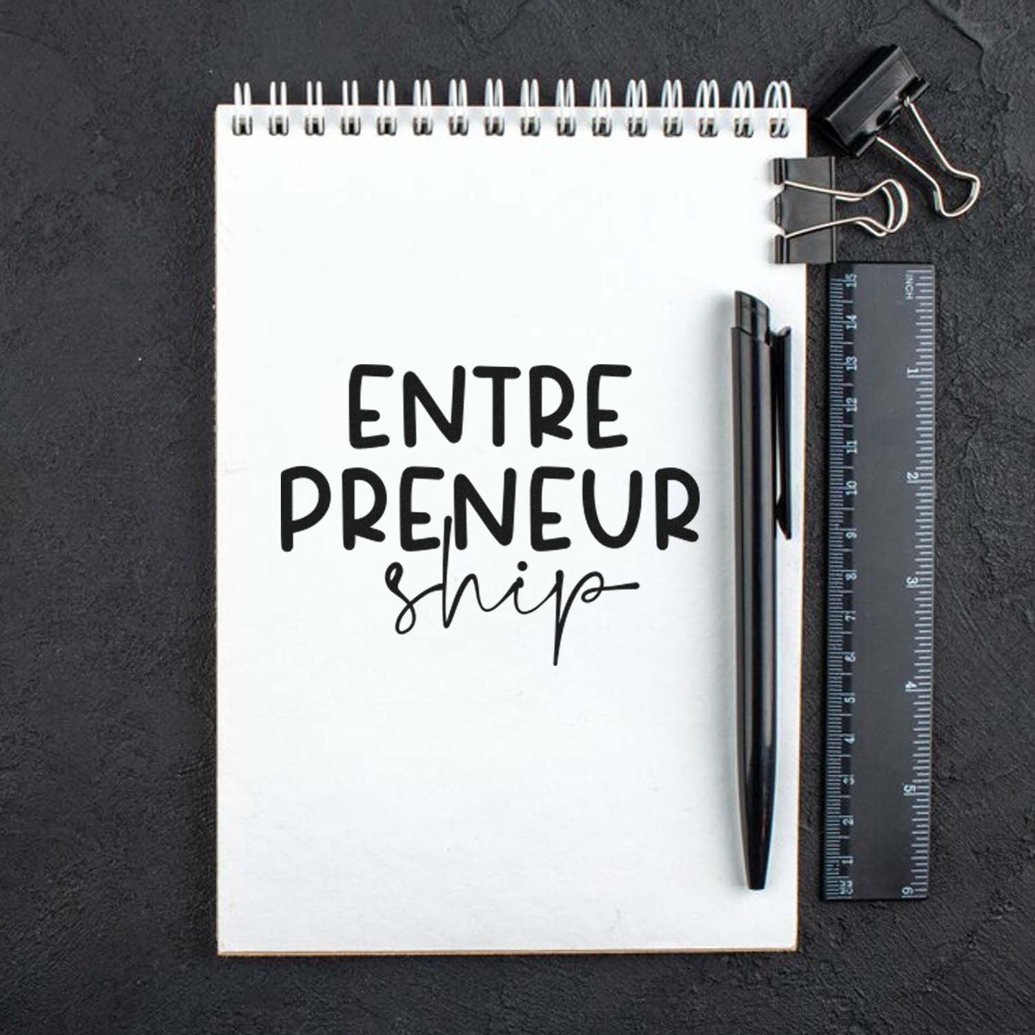 Entrepreneur ship rubber stamp mockup on notebook with pen and ruler, ideal for business branding and stationery.