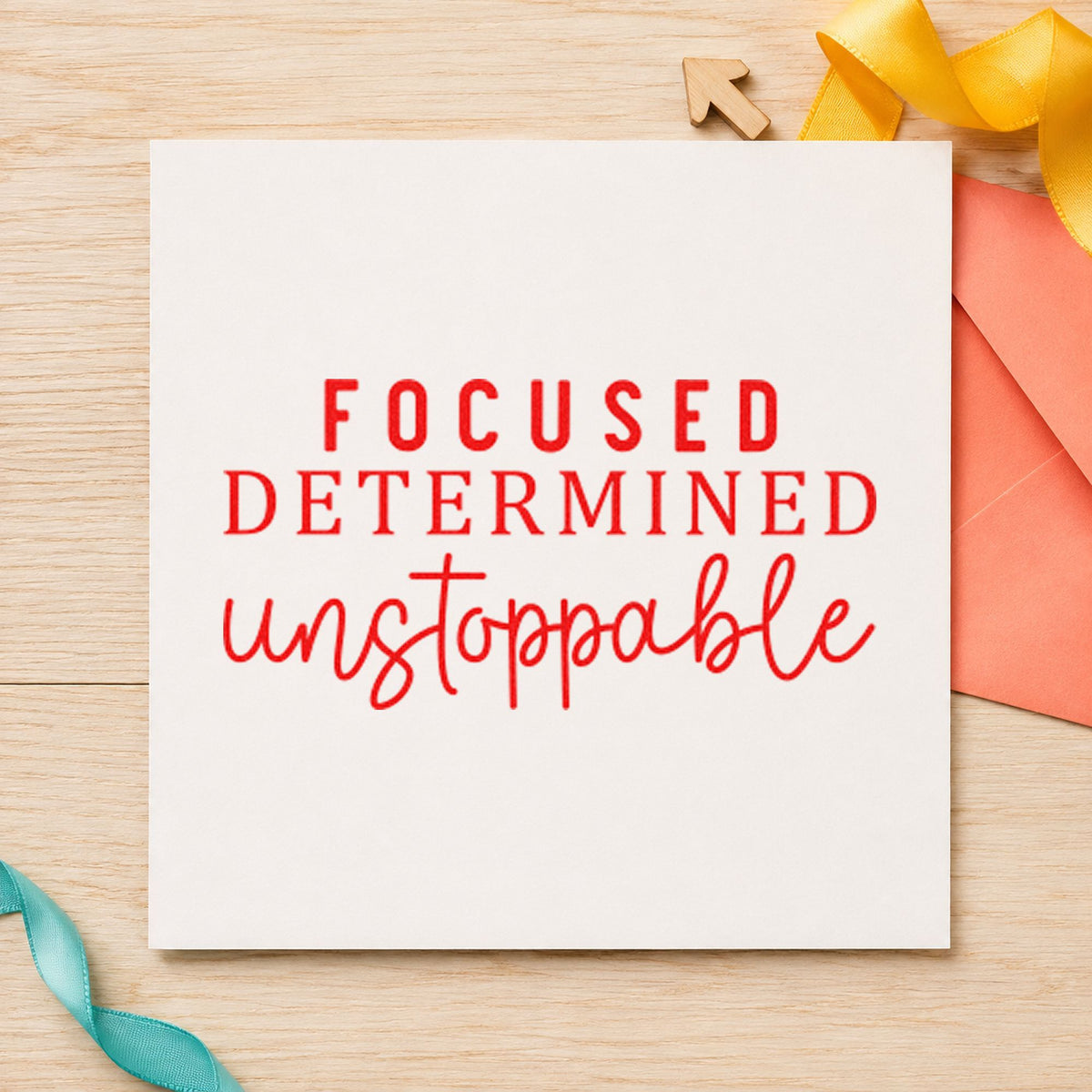 Focused Determined Unstoppable rubber stamp shown in red ink, stamped for projects such as drawer year labels.
