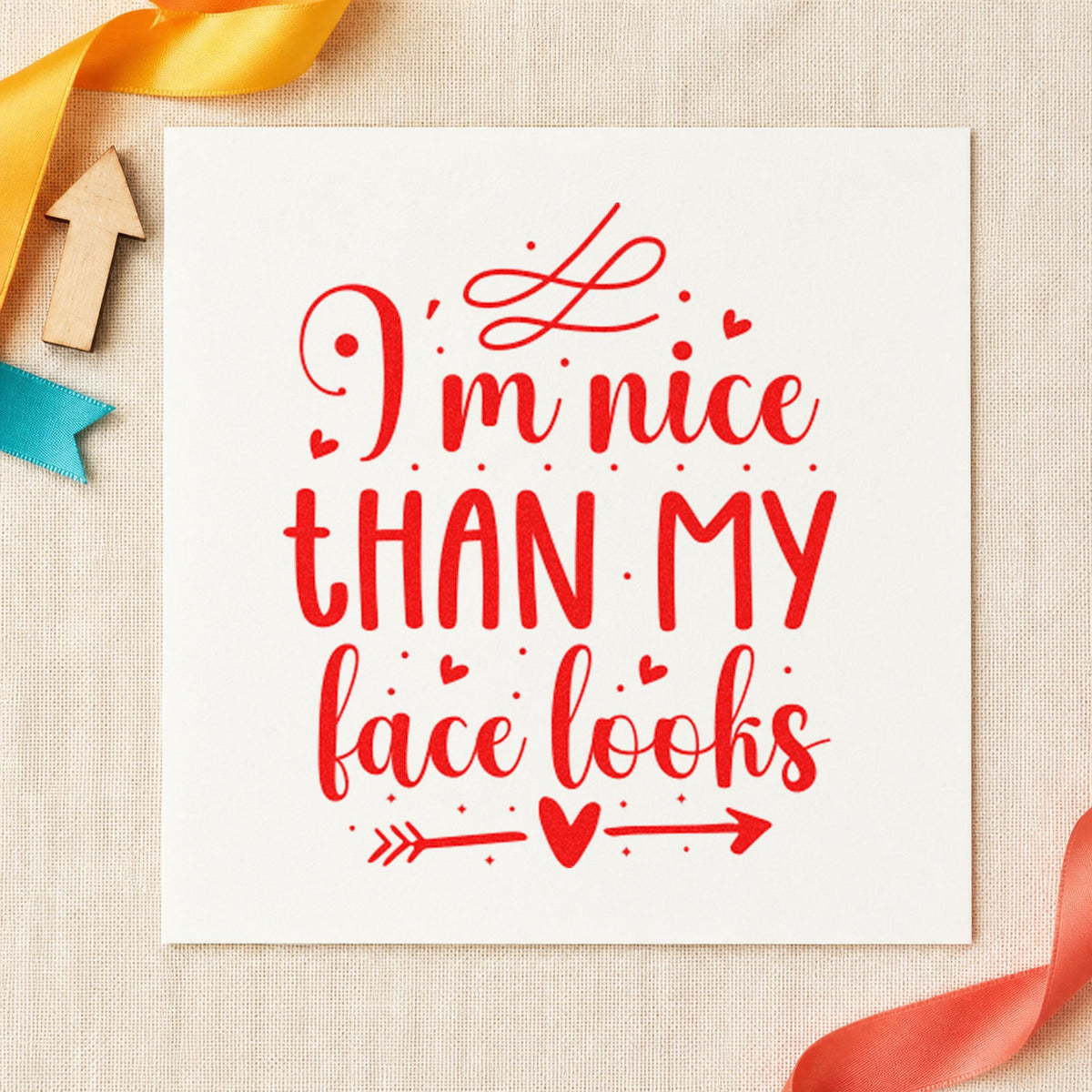 Nice Than My Face Looks craft stamp imprint in red ink on a handmade project, one idea being shop link cards.