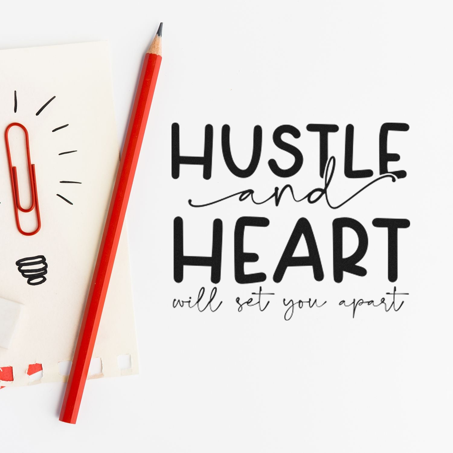 Motivational rubber stamp design reading Hustle and Heart will set you apart, styled with pencil and paper clips.