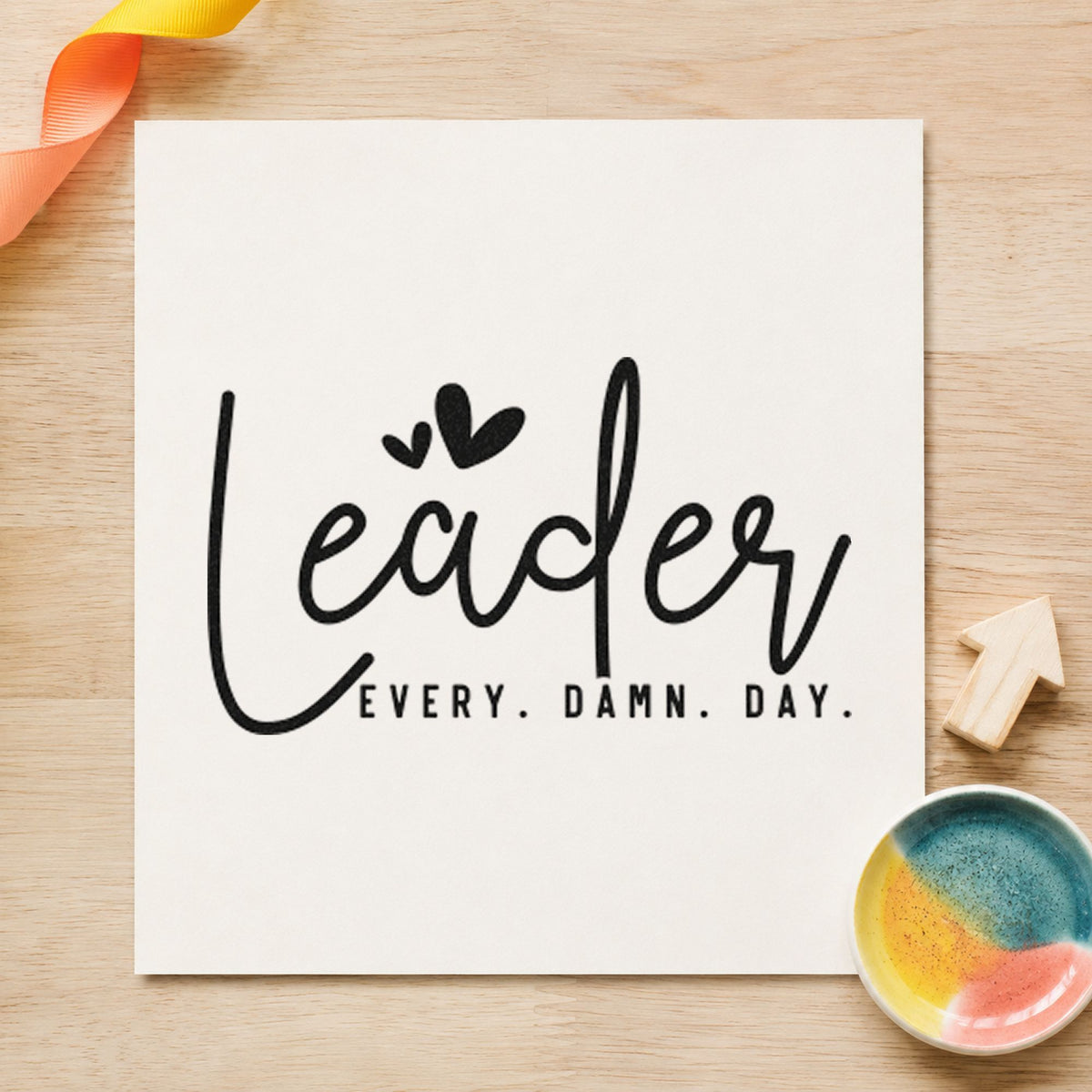 Leader Every Damn Day craft stamp imprint in black ink on a handmade project, one idea being donor gift tags.