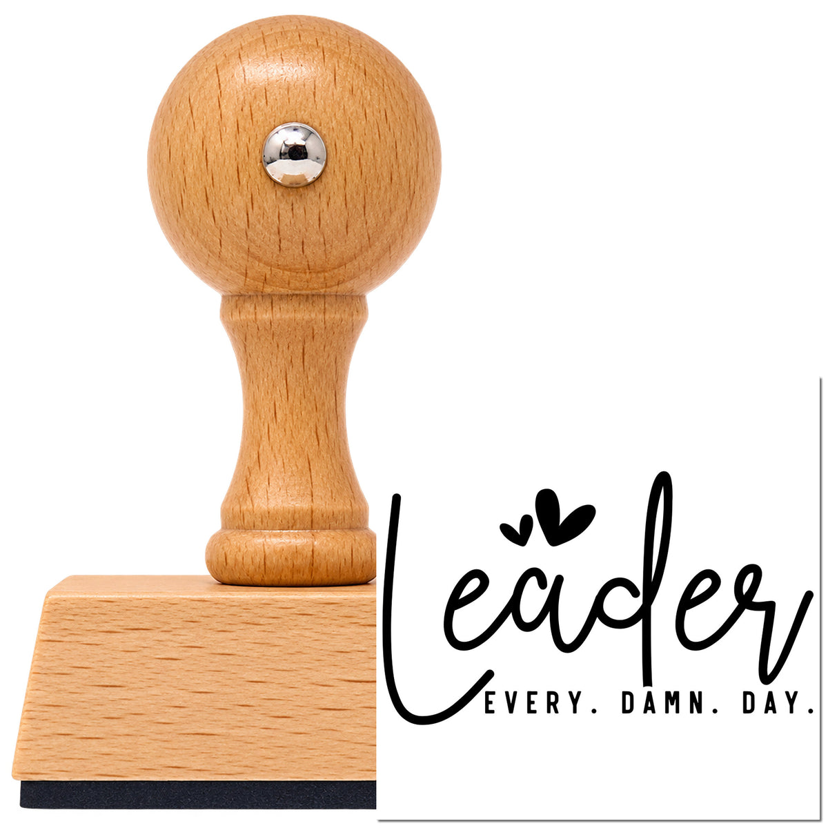 Leader Every Damn Day With Hearts Vintage Pro rubber stamp in European beech wood with a round knob handle, shown beside its black imprint.