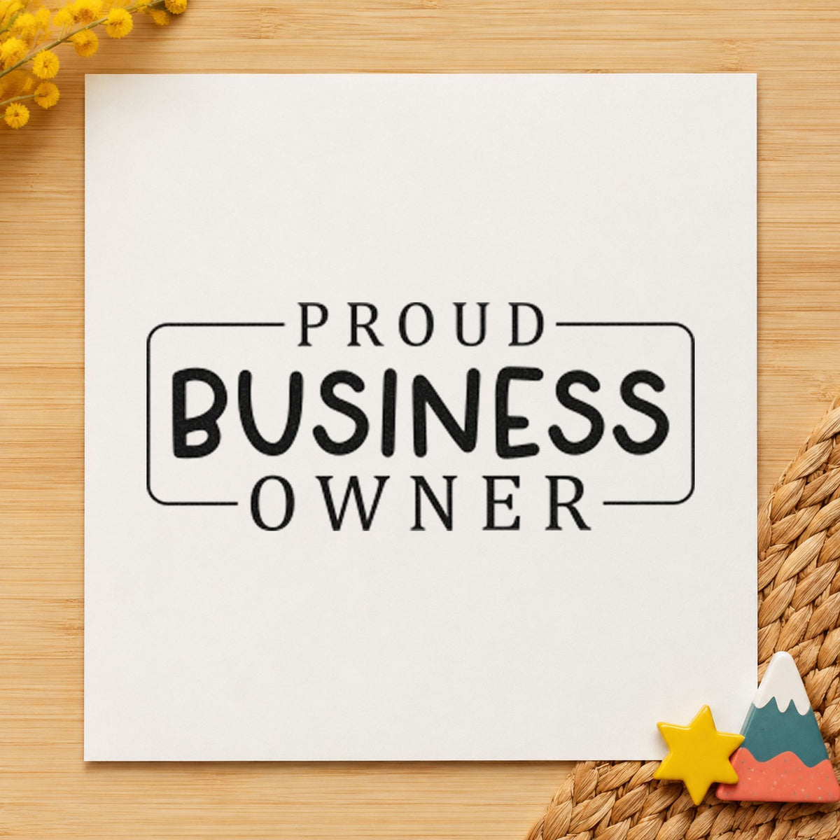 Proud Business Owner Frame craft stamp imprint in black ink on a handmade project, one idea being gift wrap tags.