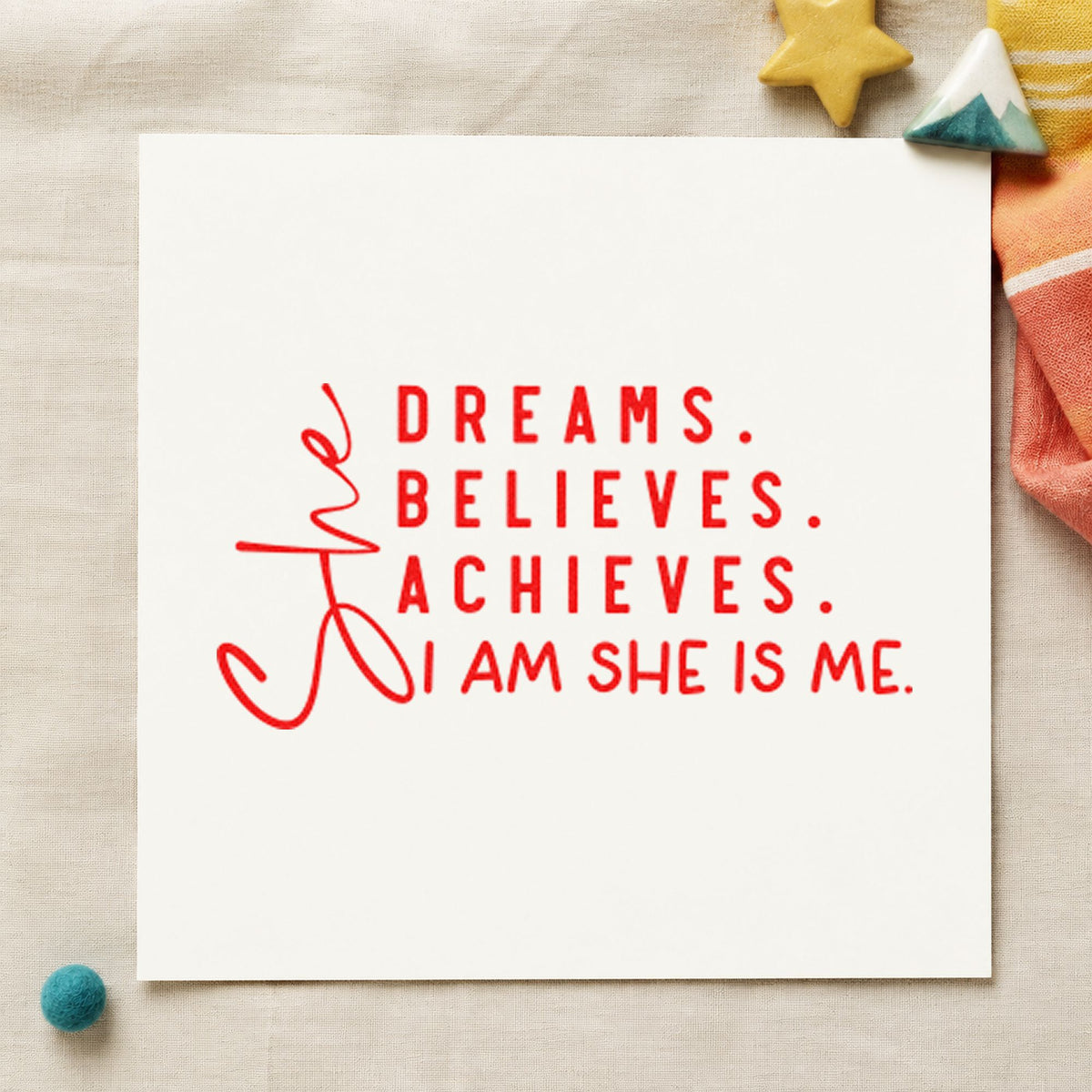 She Dreams Believes Achieves craft stamp imprint in red ink on a handmade project, one idea being artist note cards.