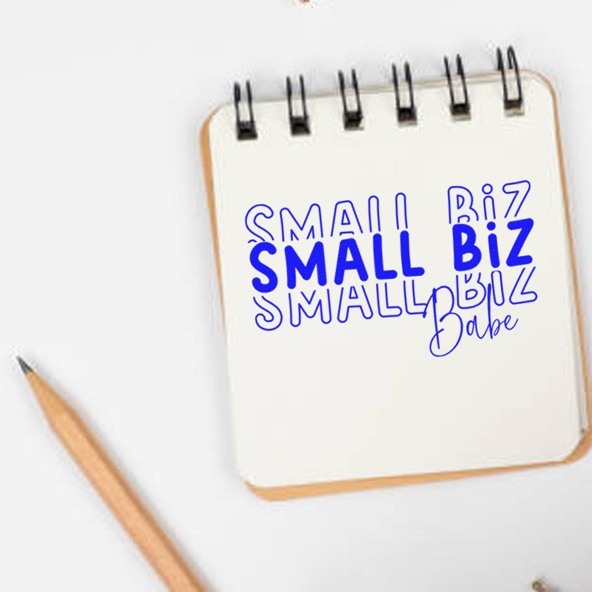 Small Biz Babe Repeated rubber stamp shown in blue ink, stamped for projects such as maker album page.