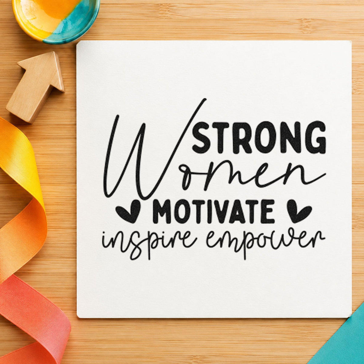 Strong Women Motivate Inspire rubber stamp printed in black ink, ready for heart accent cards and similar paper crafts.