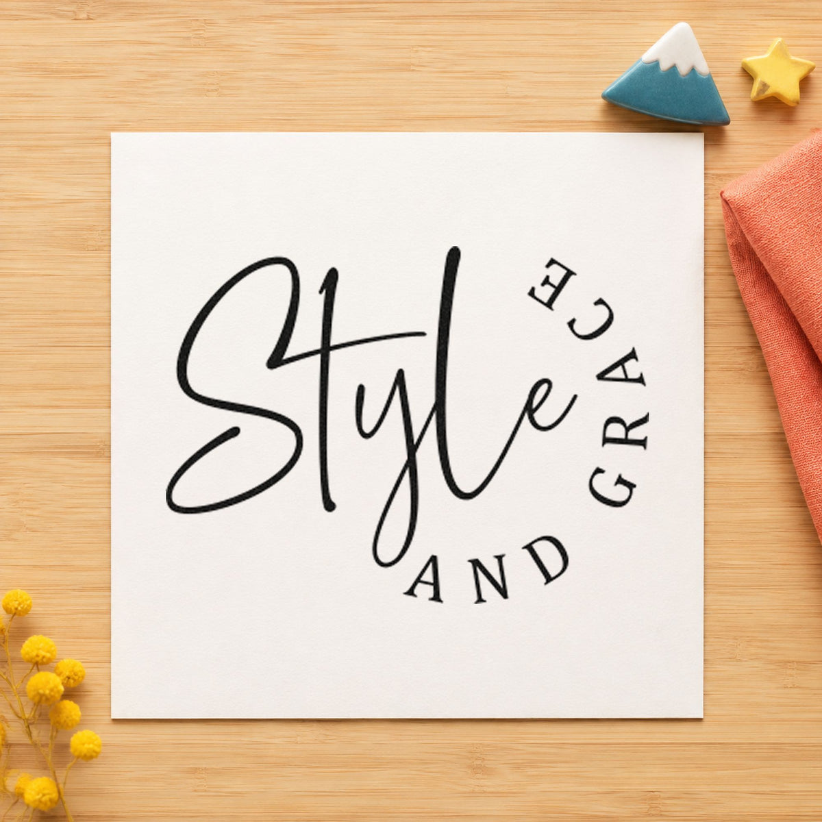 Style And Grace Lettering craft stamp imprint in black ink on a handmade project, one idea being sample board tags.