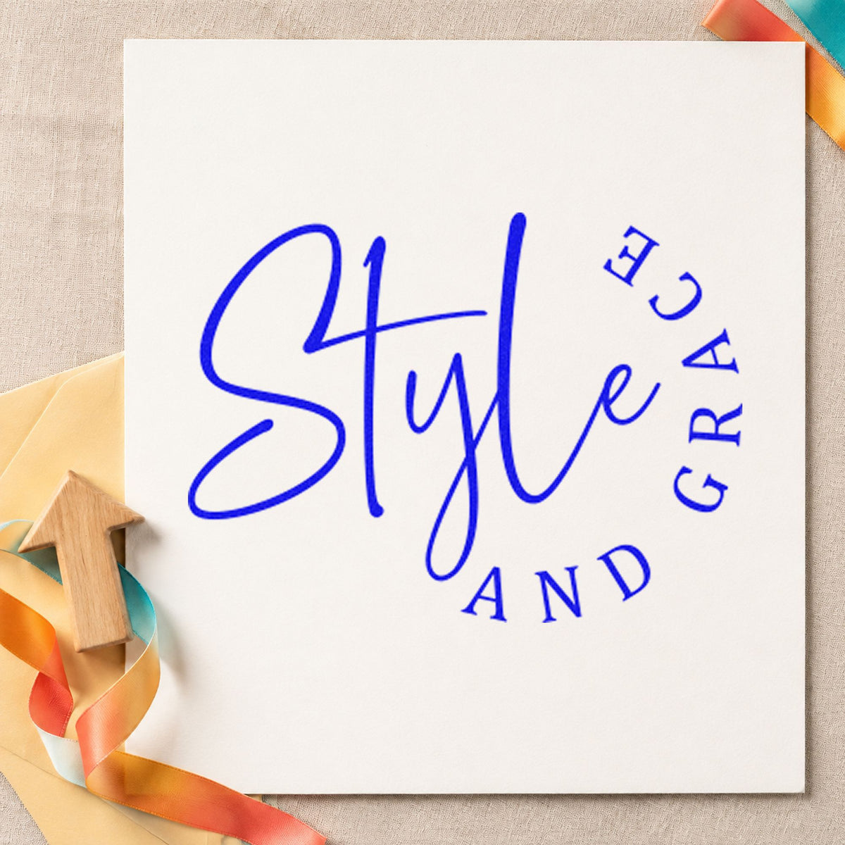 Style And Grace Lettering craft stamp imprinted in blue ink on paper, a design suited to framed studio table.