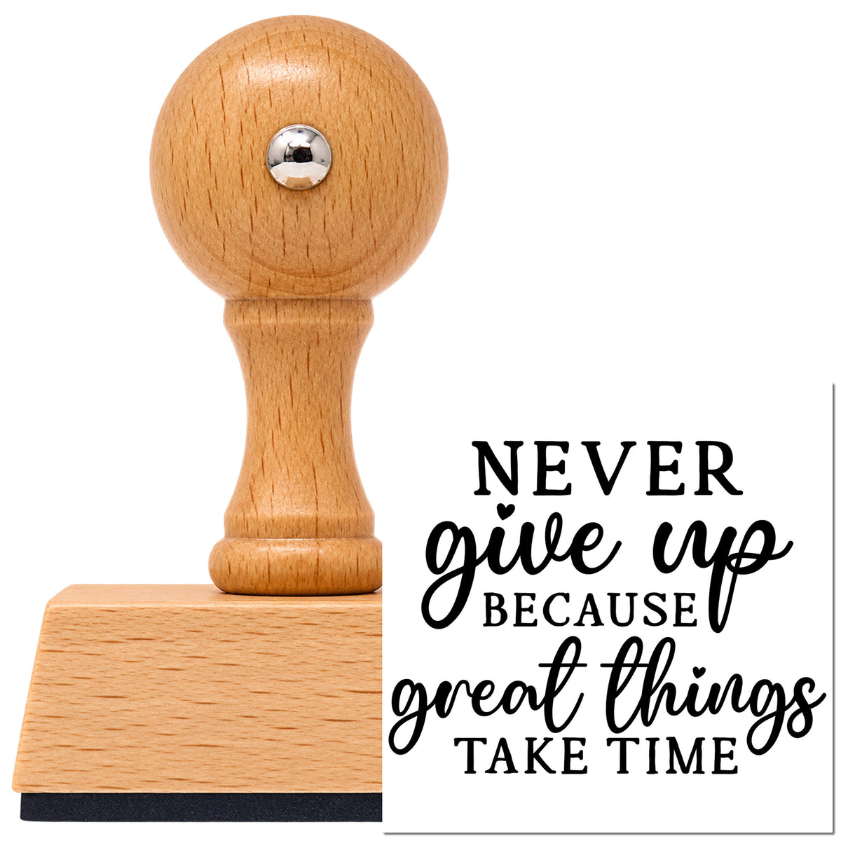 Never Give Up Great Things Vintage Pro rubber stamp in European beech wood with a round knob handle, shown beside its black imprint.