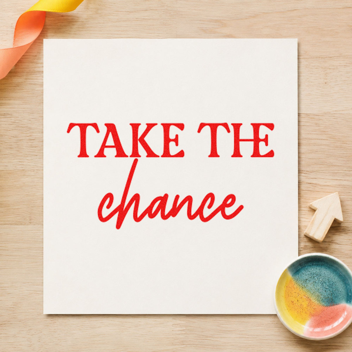 Take The Chance Lettering craft stamp imprint in red ink on a handmade project, one idea being guest question cards.