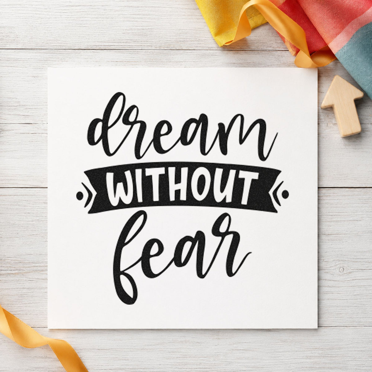 Dream Without Fear Banner craft stamp imprint in black ink on a handmade project, one idea being eyepiece gift tags.