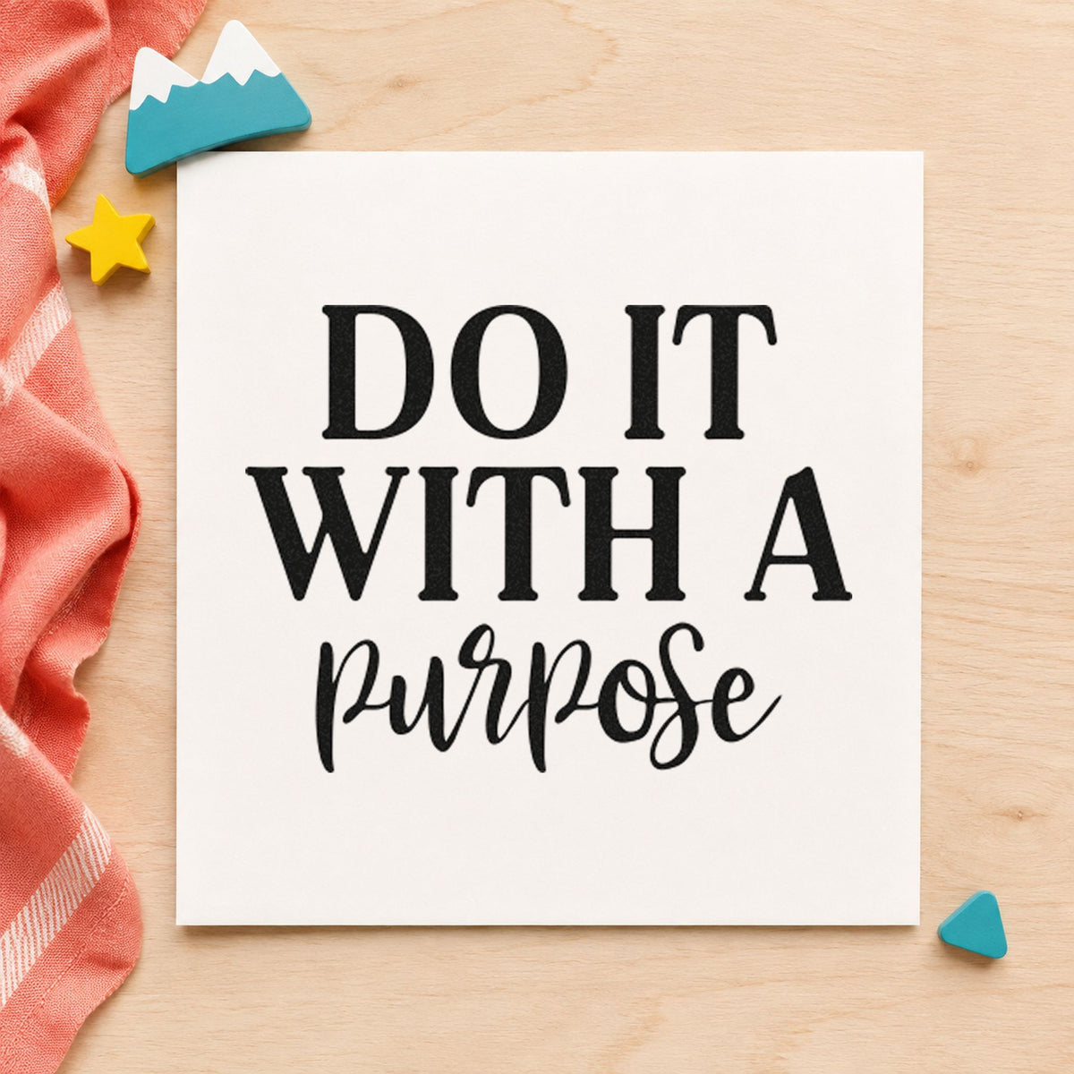 Do It With A Purpose craft stamp imprint in black ink on a handmade project, one idea being tool loan gift tags.