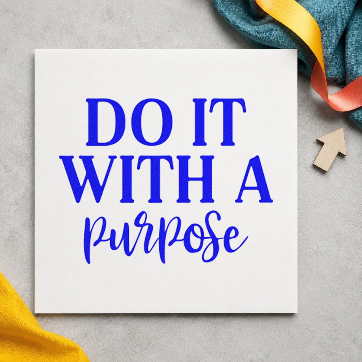Do It With A Purpose craft stamp imprinted in blue ink on paper, a design suited to framed trailhead board.