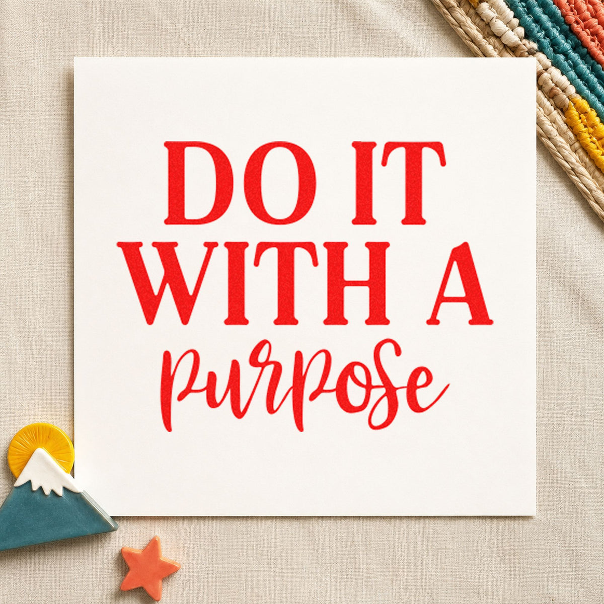 Do It With Purpose Script rubber stamp shown in red ink, stamped for projects such as shelf set labels.