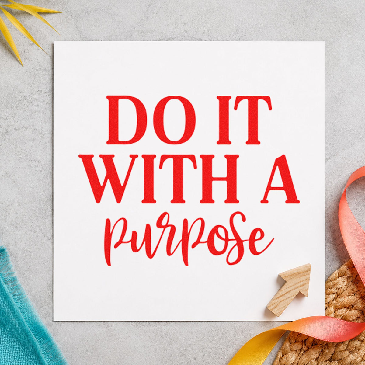 Do It With Purpose Script craft stamp imprint in red ink on a handmade project, one idea being opening study cards.