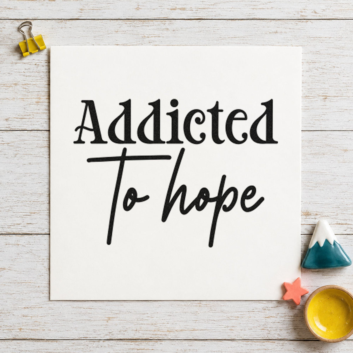 Addicted To Hope Lettering craft stamp imprint in black ink on a handmade project, one idea being fly box gift tags.