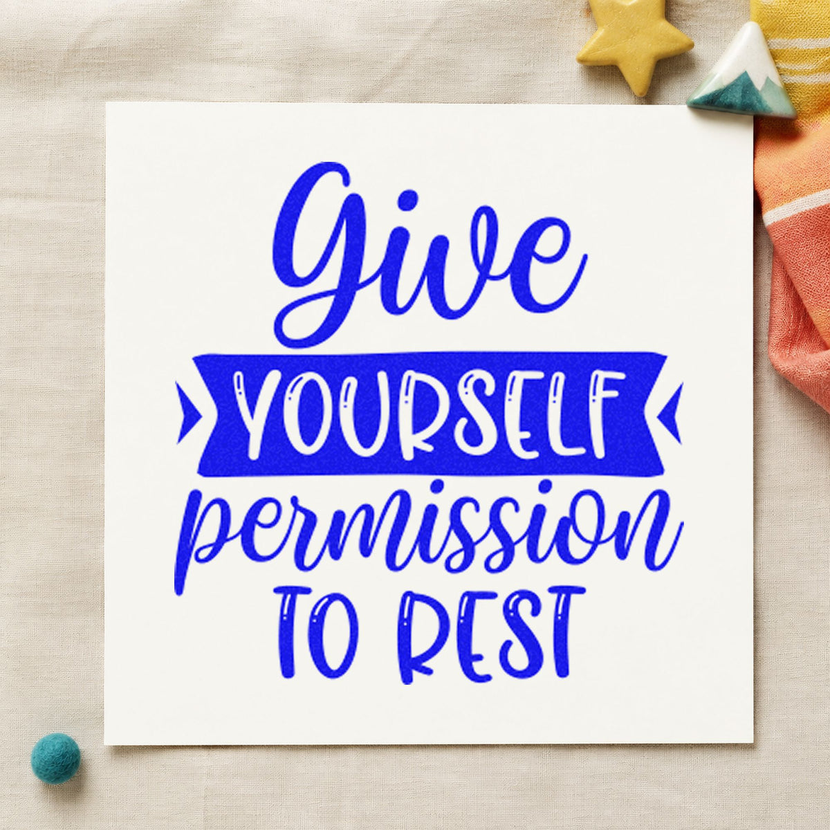 Give Yourself Permission To Rest craft stamp imprinted in blue ink on paper, a design suited to framed back porch.