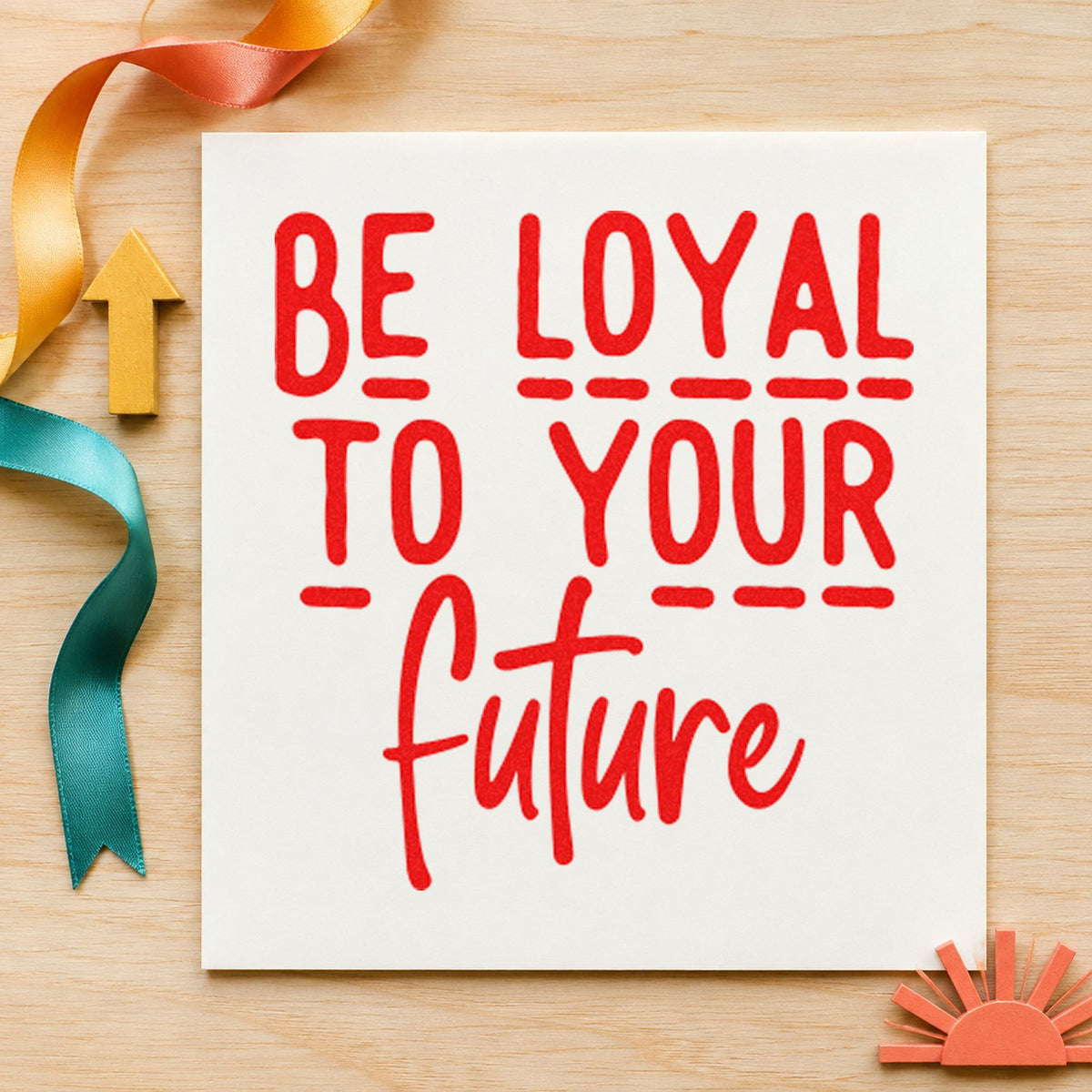 Be Loyal To Your Future craft stamp imprint in red ink on a handmade project, one idea being practice test cards.