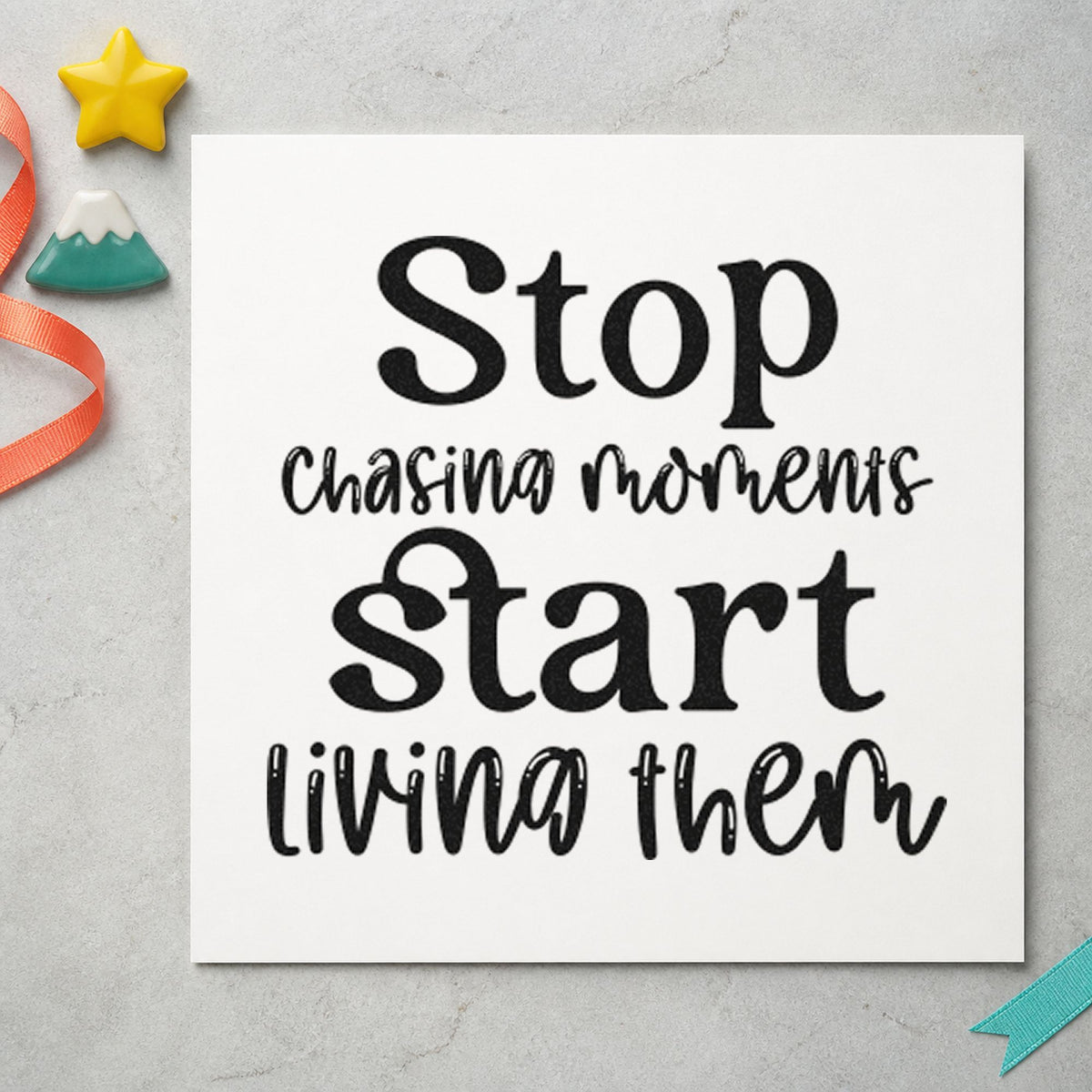 Stop Chasing Start Living craft stamp imprint in black ink on a handmade project, one idea being ticket envelope tags.