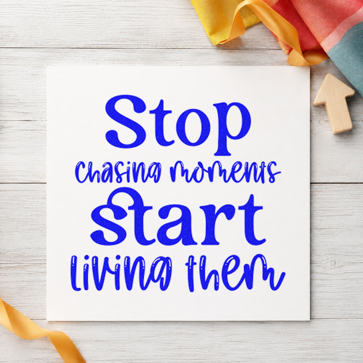 Stop Chasing Start Living craft stamp imprinted in blue ink on paper, a design suited to framed record shelf.