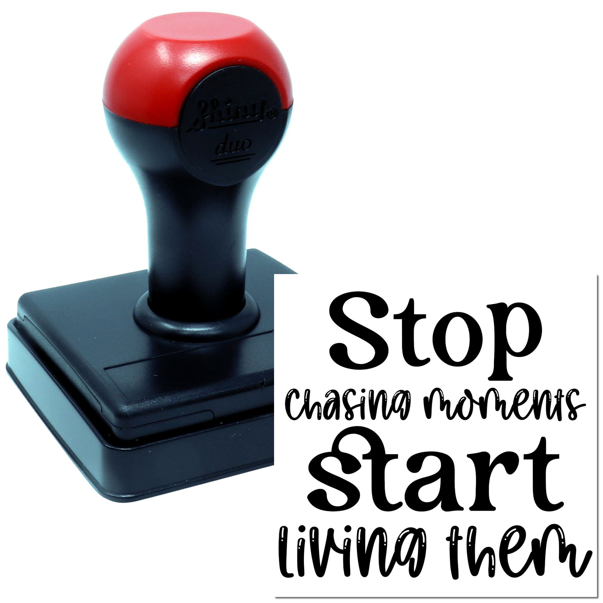 Self-inking rubber stamp featuring Stop Chasing Moments Start Living Them motivational quote for crafts and branding.