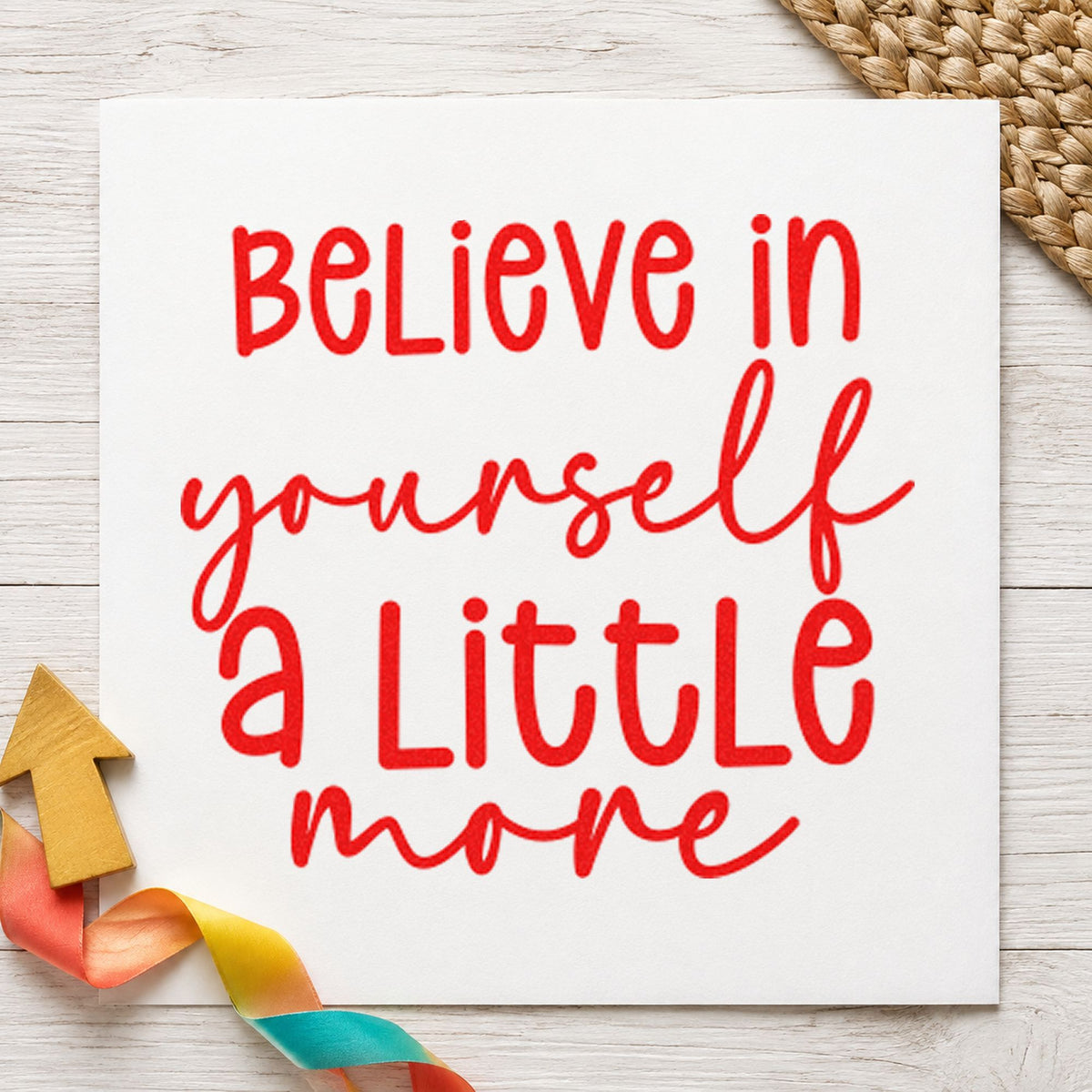 Believe Yourself A Little More craft stamp imprint in red ink on a handmade project, one idea being feedback slip cards.