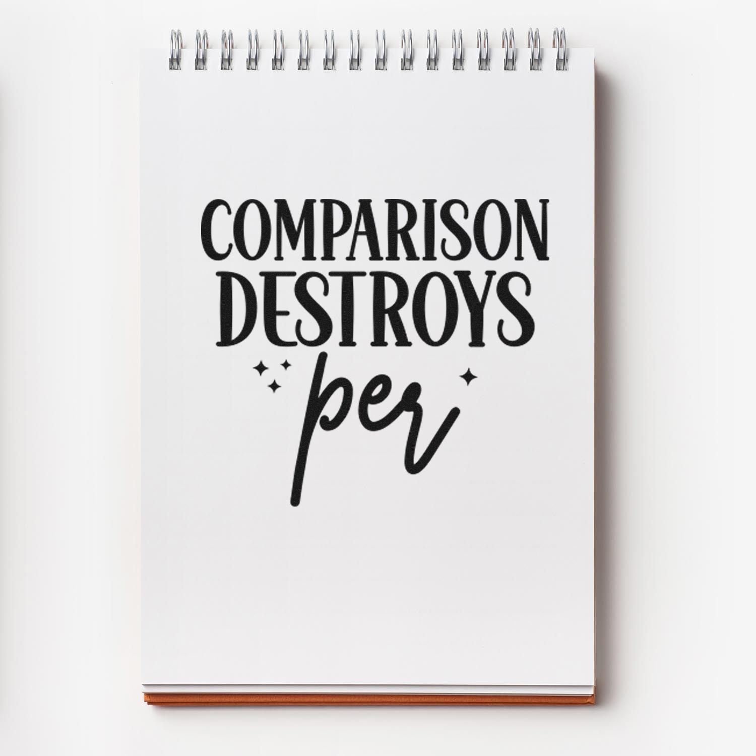 Motivational rubber stamp design reading Comparison destroys per for journals, planners, and office branding.