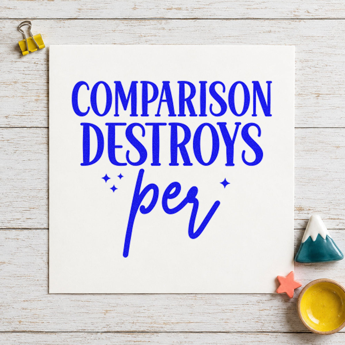 Comparison Destroys Per Lettering craft stamp in blue ink on cardstock, an easy option for machine cover printing.