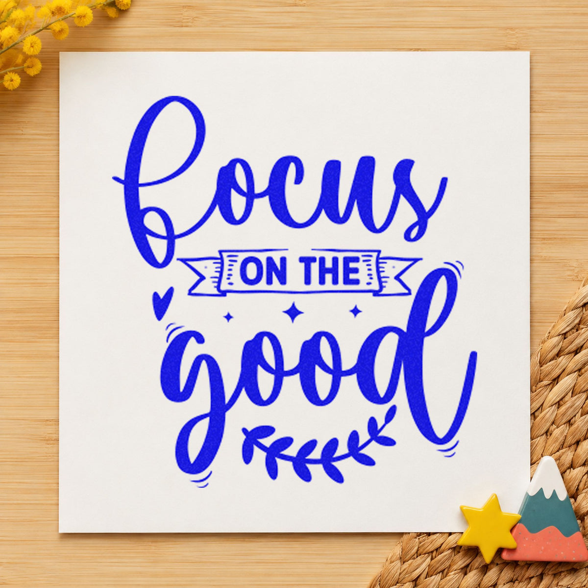 Focus On The Good Leaves craft stamp in blue ink on cardstock, an easy option for table cloth printing.