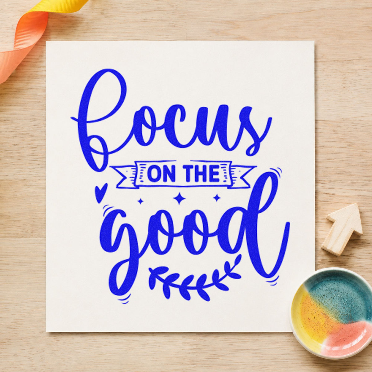 Focus On The Good Leaves craft stamp imprinted in blue ink on paper, a design suited to framed activity room.