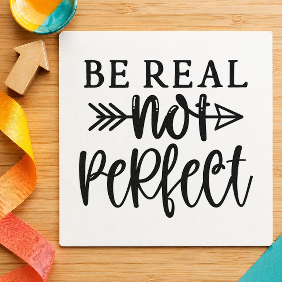Be Real Not Perfect craft stamp imprint in black ink on a handmade project, one idea being meal drop gift tags.