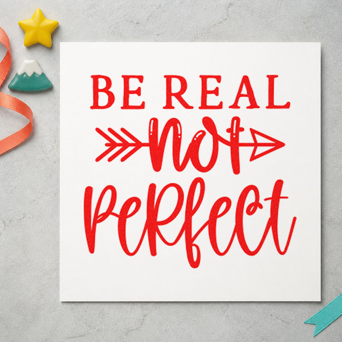 Be Real Not Perfect rubber stamp shown in red ink, stamped for projects such as shelf staple labels.