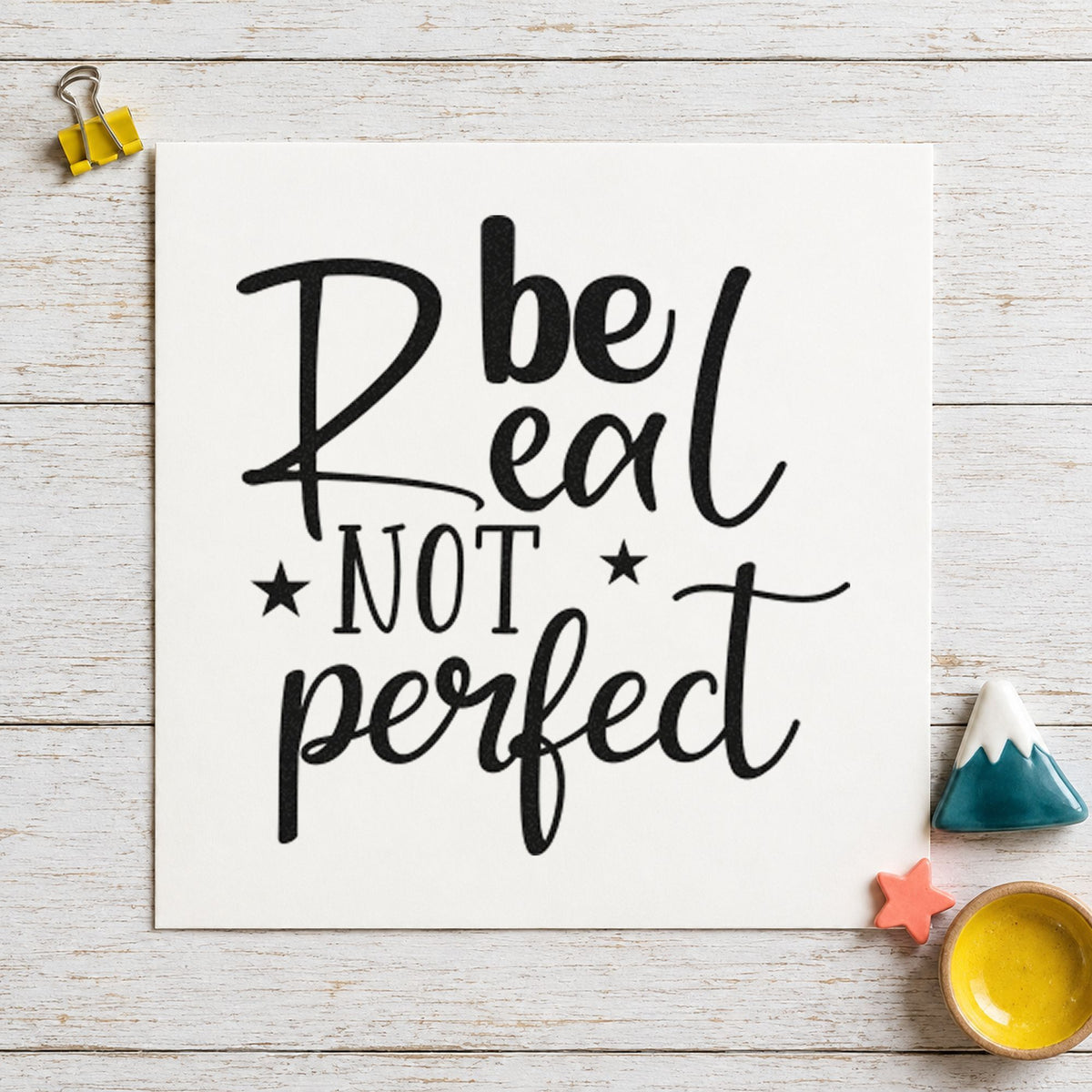 Be Real Not Perfect Stars craft stamp imprint in black ink on a handmade project, one idea being paper pack gift tags.
