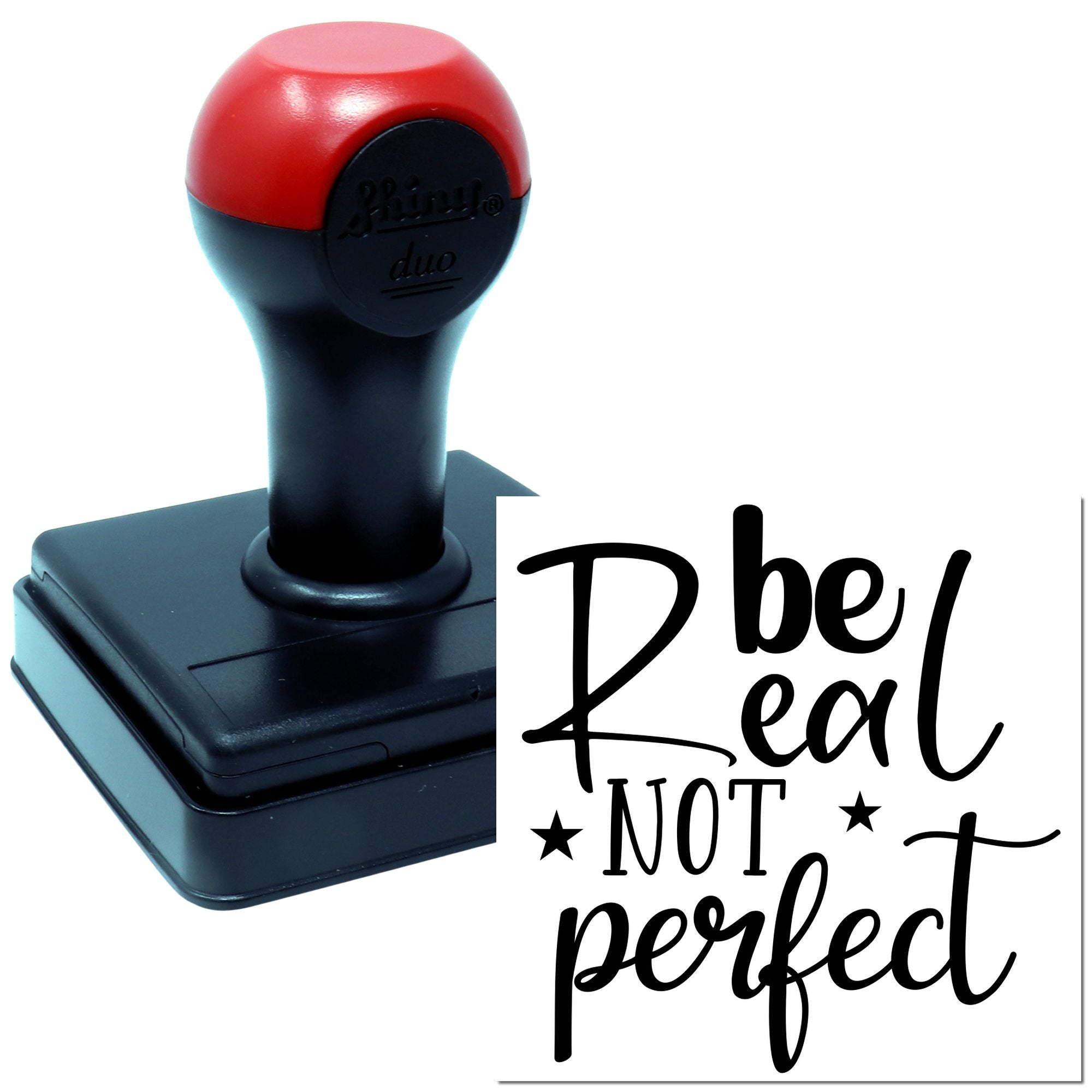 Self-inking rubber stamp with Be Real Not Perfect design for crafting, journaling, and personalized stamping.