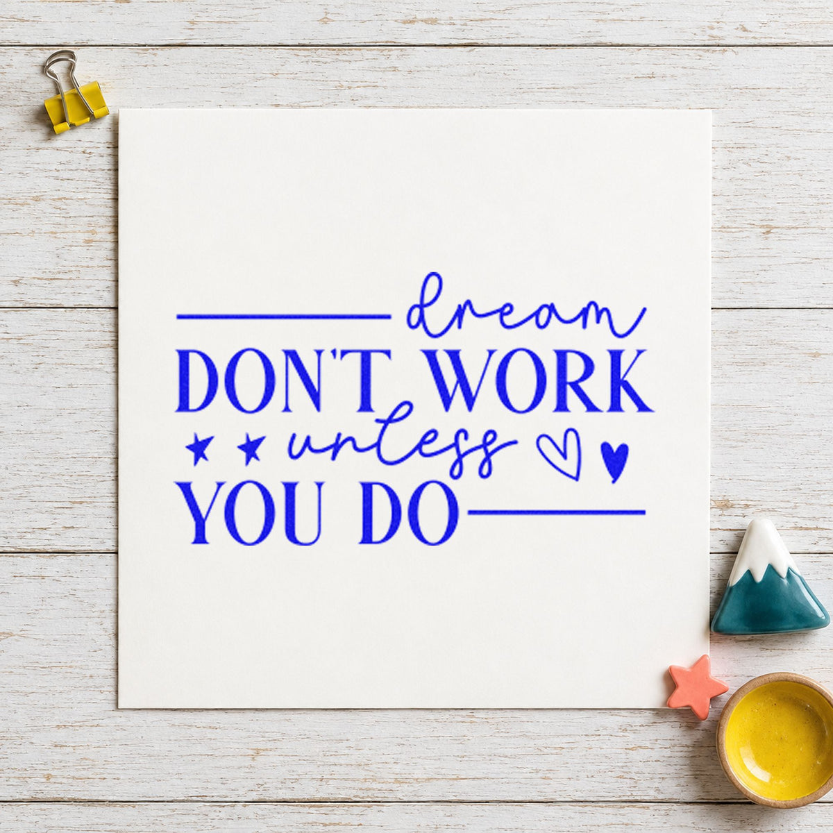 Dream Don't Work Unless You craft stamp imprinted in blue ink on paper, a design suited to framed practice net.