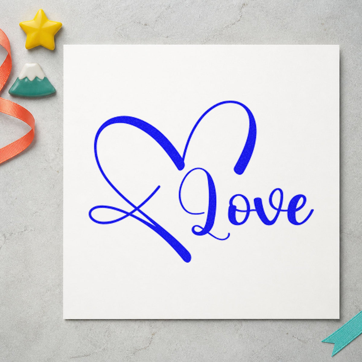 Love Heart Outline craft stamp in blue ink on cardstock, an easy option for picnic cloth printing.