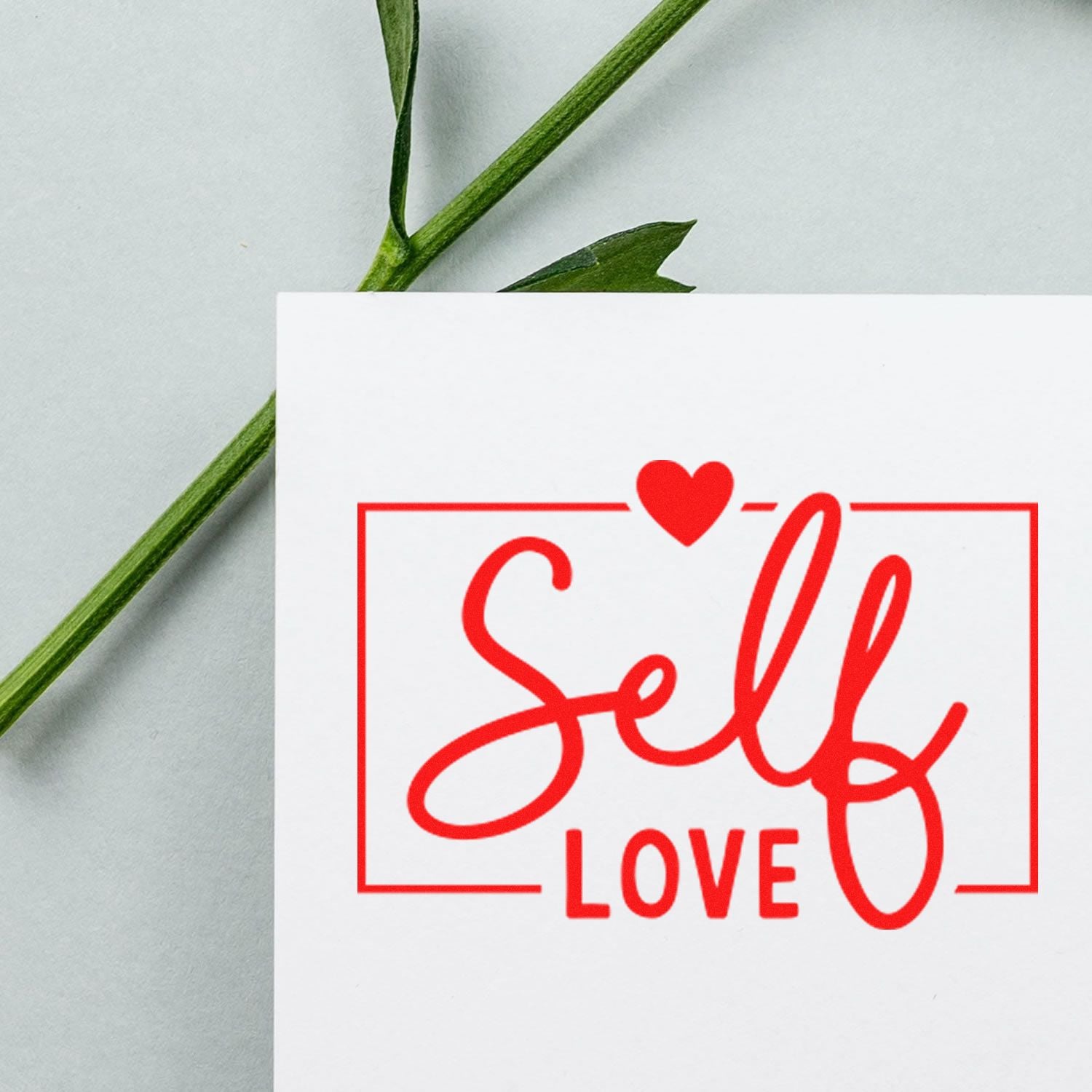 Self Love rubber stamp design with heart accent, perfect for custom crafting, handmade cards, and self-care projects.