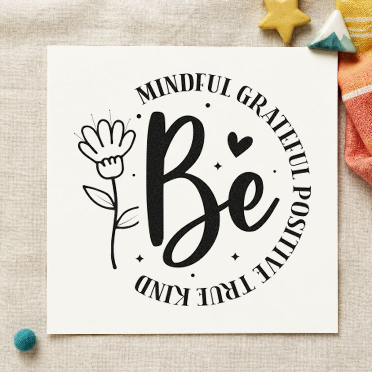 Be Mindful Grateful Positive craft stamp imprint in black ink on a handmade project, one idea being roller bottle tags.