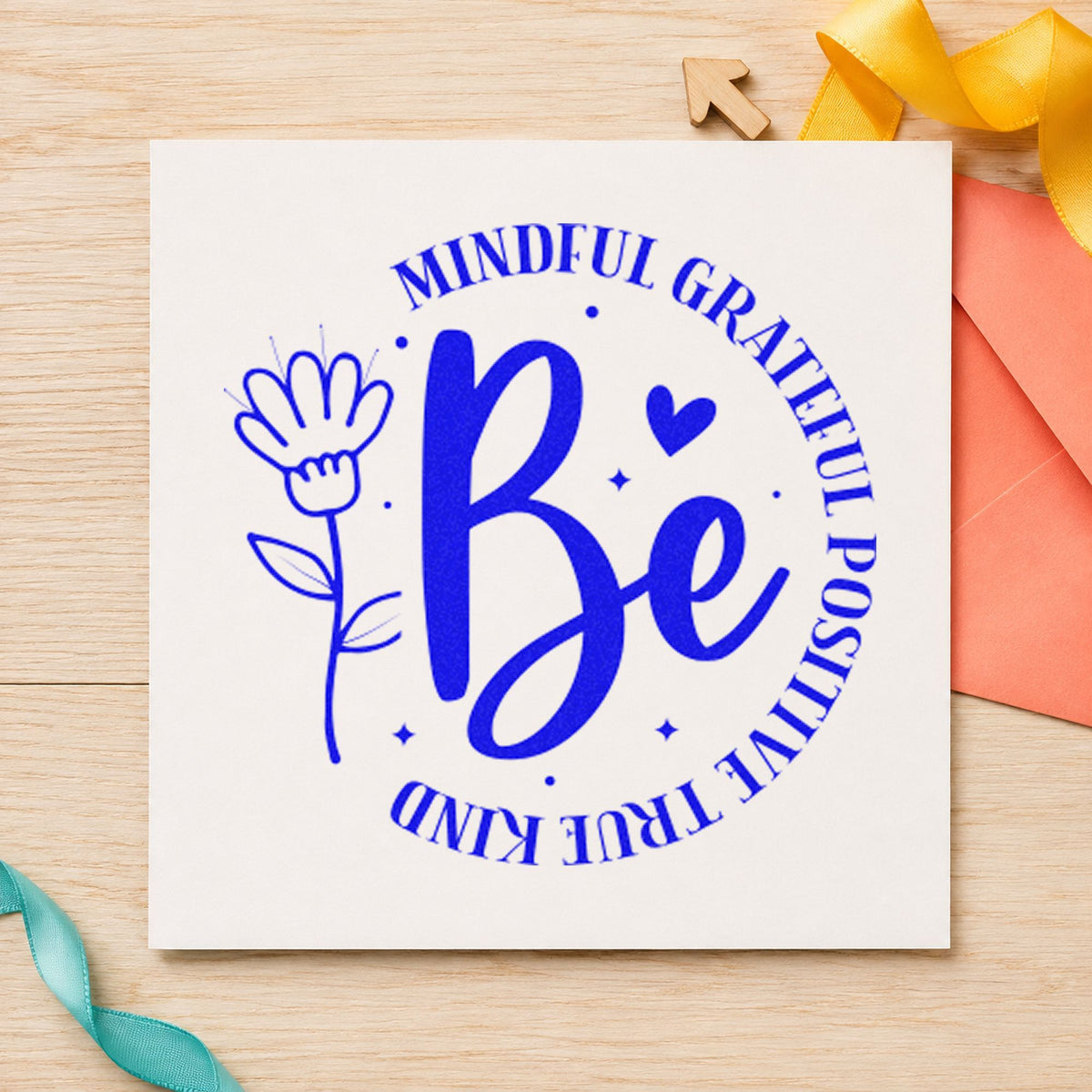Be Mindful Grateful Positive craft stamp imprinted in blue ink on paper, a design suited to framed mixing nook.